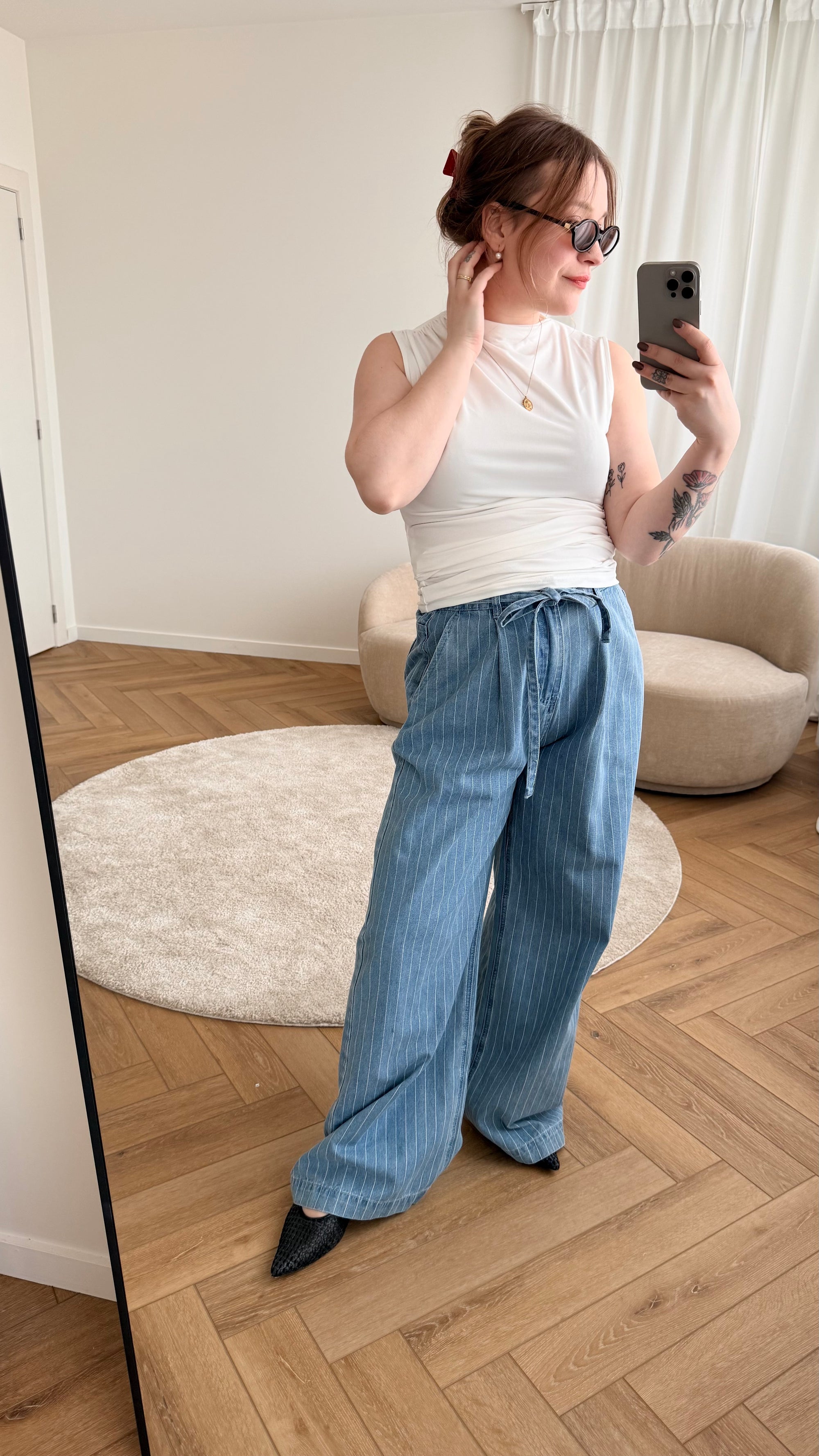 Pompon striped jeans