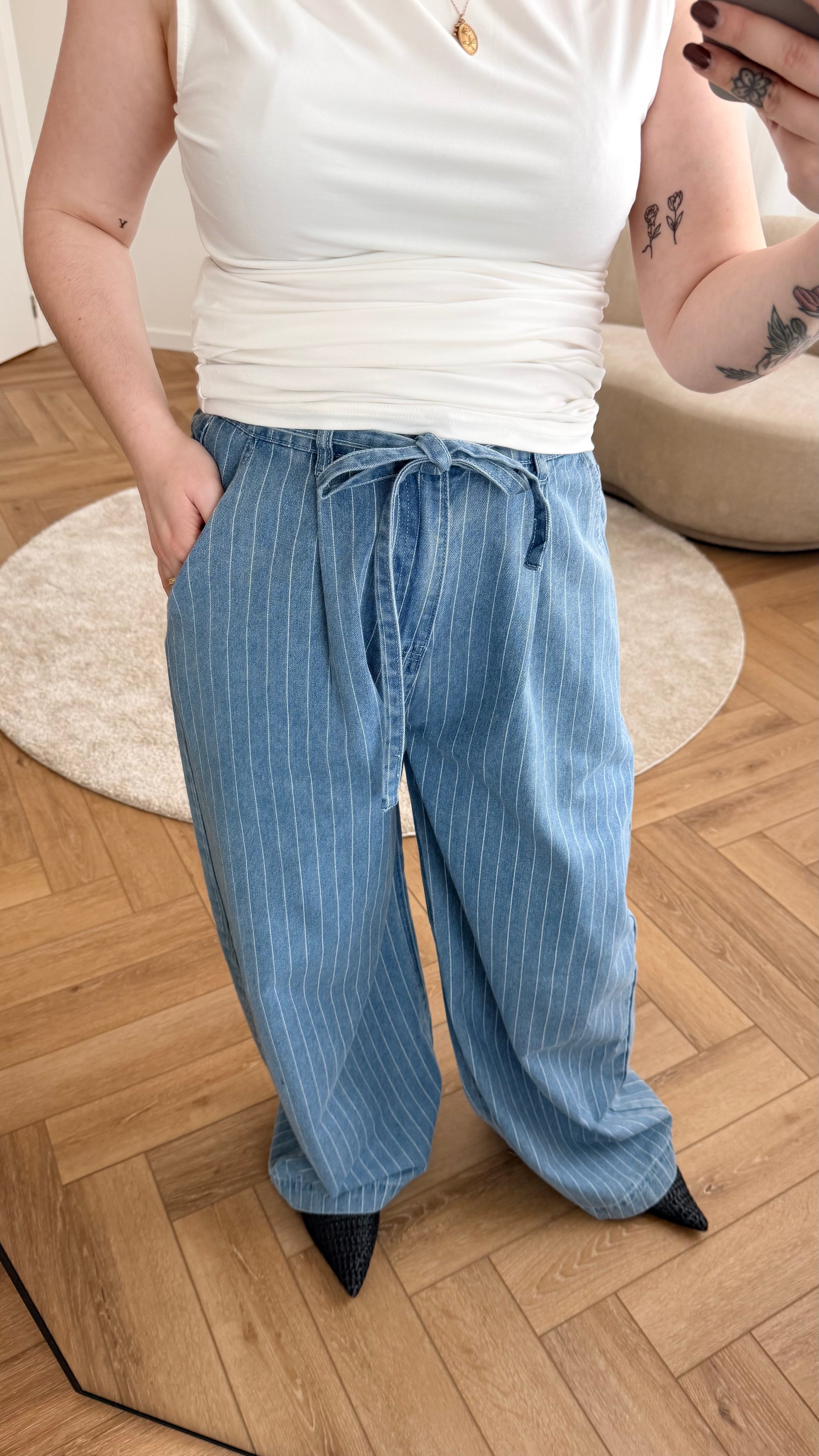 Pompon striped jeans