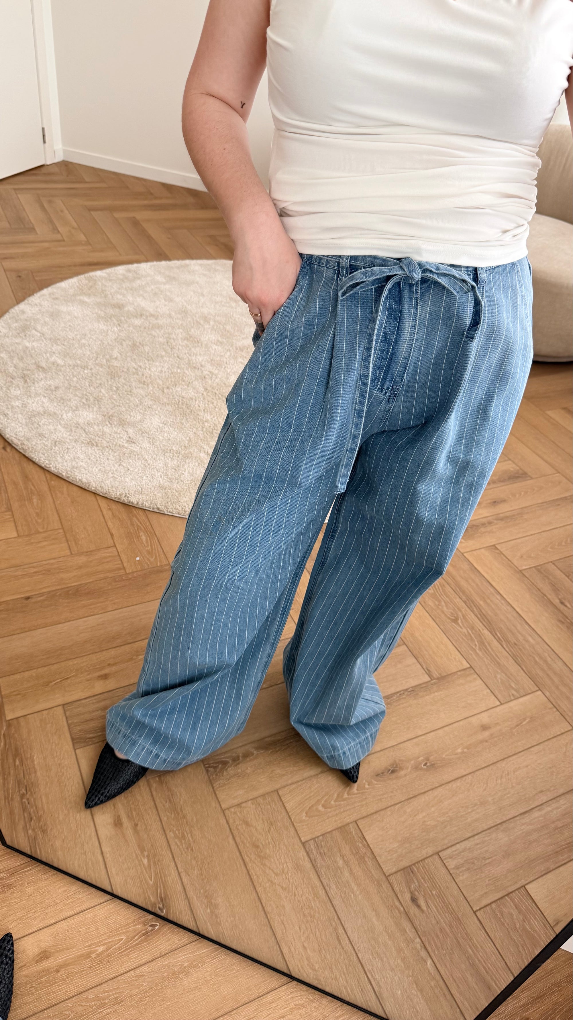 Pompon striped jeans